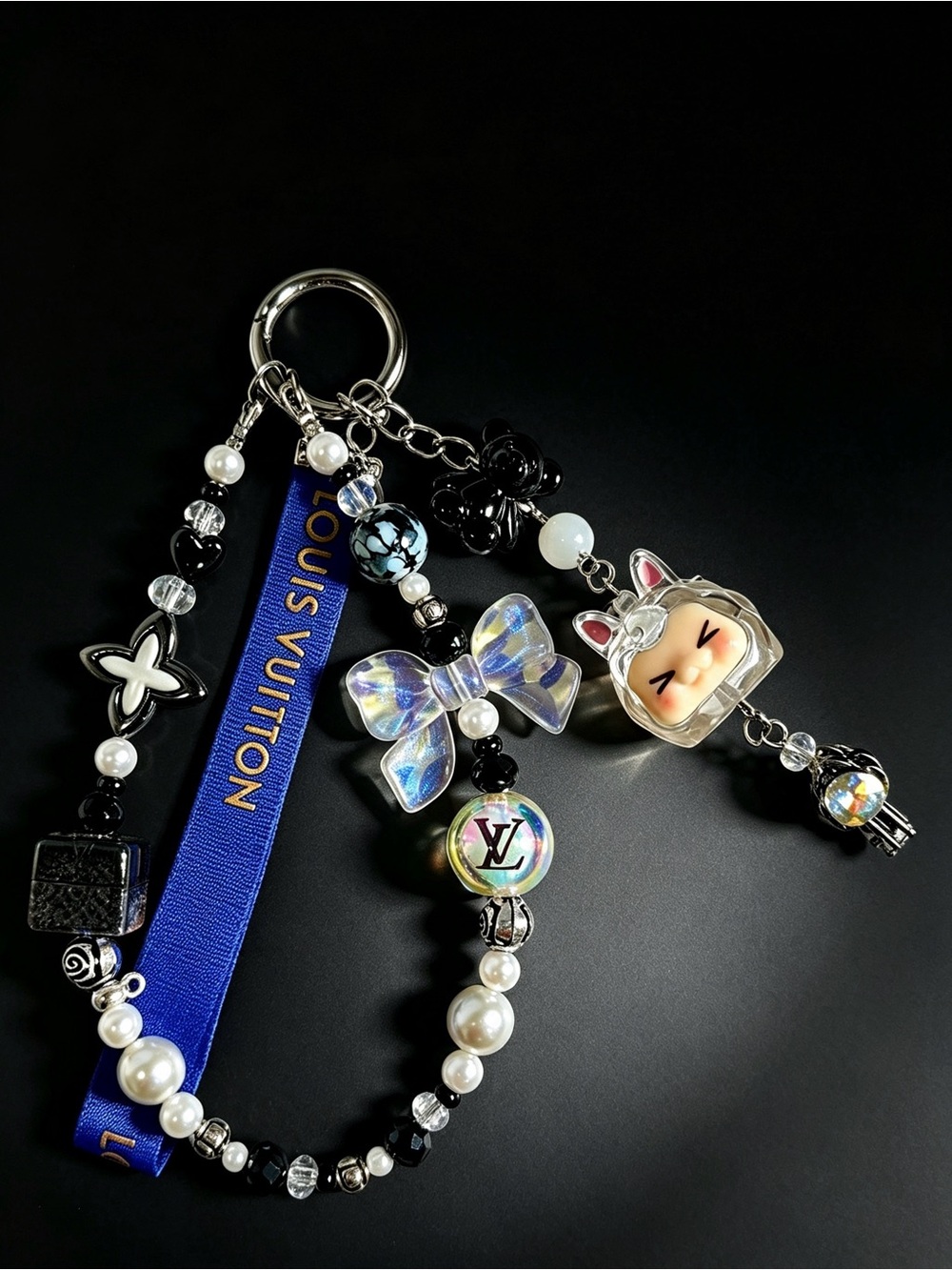 Auth LV Blue Ribbon Charm Keychain with Iridescent Bow